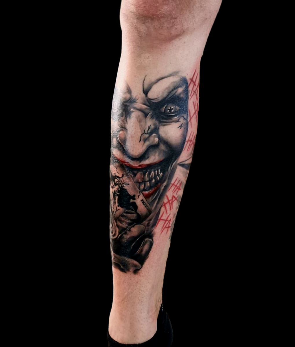 joker leg tattoo black grey red bloody ink pegau