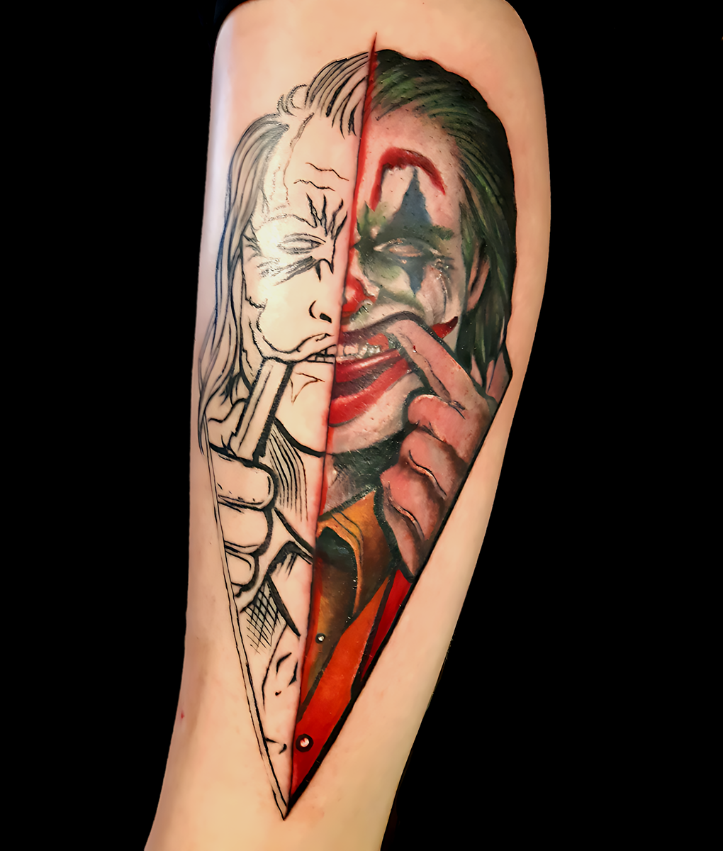 joker split face color tattoo arm bloody ink pegau