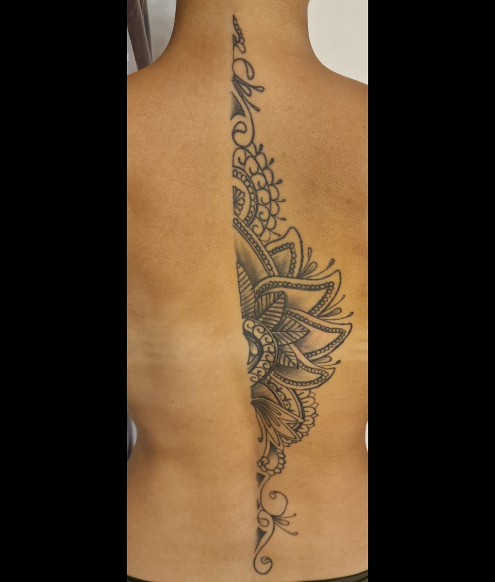 mandala spine tattoo back bloody ink pegau